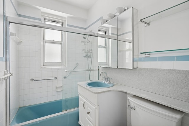 2400 Johnson Ave Unit 1K, Bronx, NY 10463 - full bathroom featuring vanity, decorative backsplash, and bath / shower combo with glass door