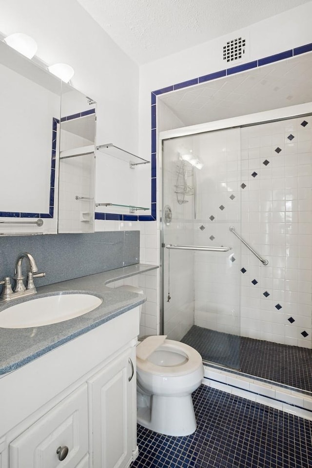 2400 Johnson Ave Unit 1K, Bronx, NY 10463 - full bath featuring vanity, a stall shower, tile patterned flooring, and tile walls