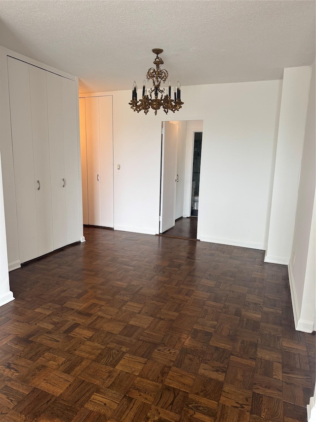 2400 Johnson Ave Unit 1K, Bronx, NY 10463 - spare room featuring a chandelier and a textured ceiling