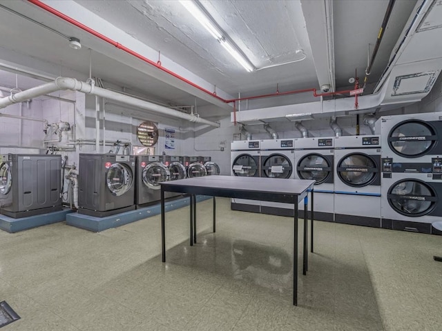 5500 Fieldstone Unit 4Ii, Bronx, NY 10471 - rec room with estacked washer and dryer, washer and dryer, and tile patterned floors