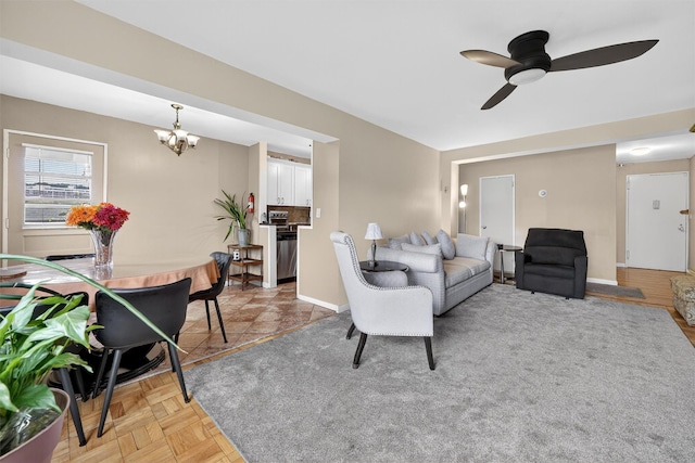 505 Central Ave Unit 408, White Plains, NY 10606 - living area featuring a chandelier and a ceiling fan
