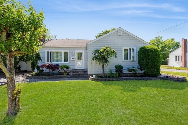 118 Pine Neck Ave, East Patchogue, NY 11772 - ranch-style house with a front lawn