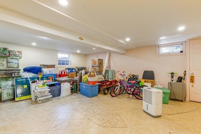 118 Pine Neck Ave, East Patchogue, NY 11772 - basement with plenty of natural light, recessed lighting, and tile patterned floors