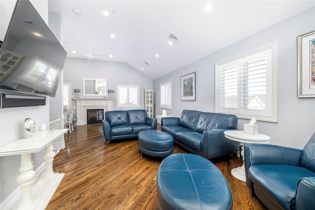 87 Arizona Ave, Long Beach, NY 11561 - living area featuring wood finished floors, a fireplace, ceiling fan, vaulted ceiling, and recessed lighting