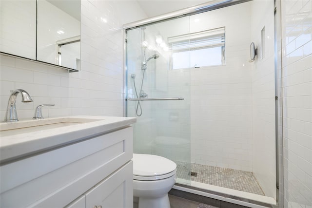 87 Arizona Ave, Long Beach, NY 11561 - bathroom featuring vanity, a stall shower, tile walls, and tasteful backsplash