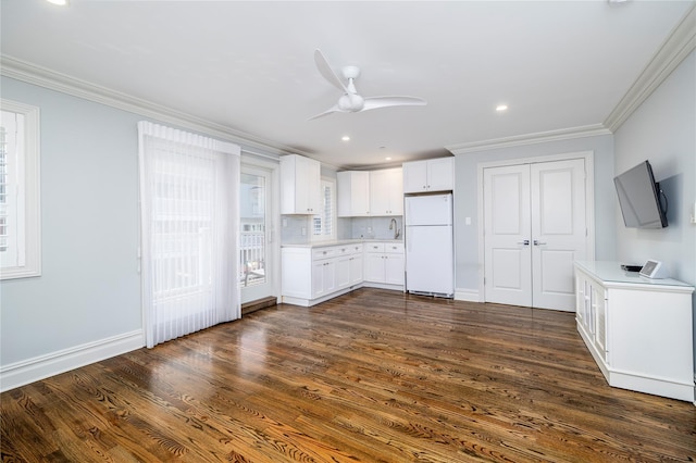 87 Arizona Ave, Long Beach, NY 11561 - unfurnished living room with a ceiling fan, ornamental molding, dark wood-style floors, and recessed lighting