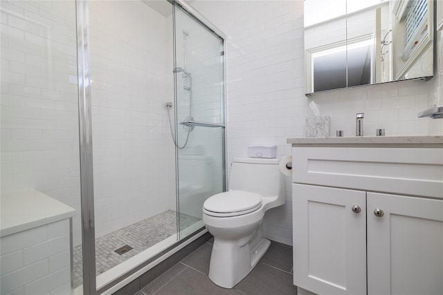 87 Arizona Ave, Long Beach, NY 11561 - full bath with tile walls, tile patterned floors, a stall shower, and vanity