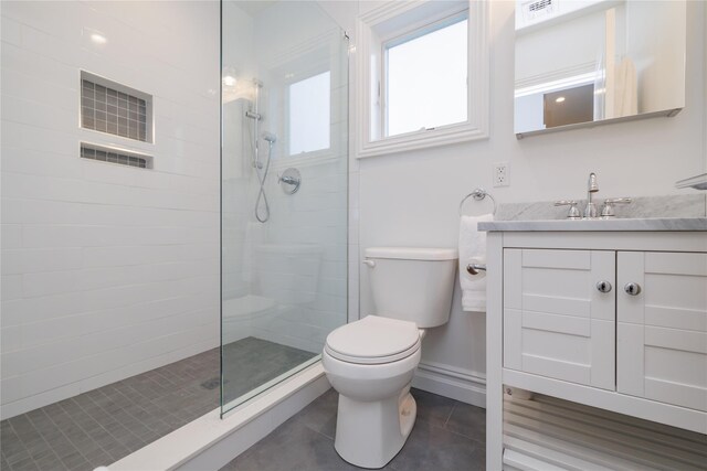 87 Arizona Ave, Long Beach, NY 11561 - bathroom featuring tile patterned floors, vanity, and a walk in shower