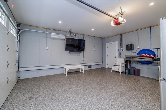 87 Arizona Ave, Long Beach, NY 11561 - garage featuring a garage door opener, a wall unit AC, and recessed lighting