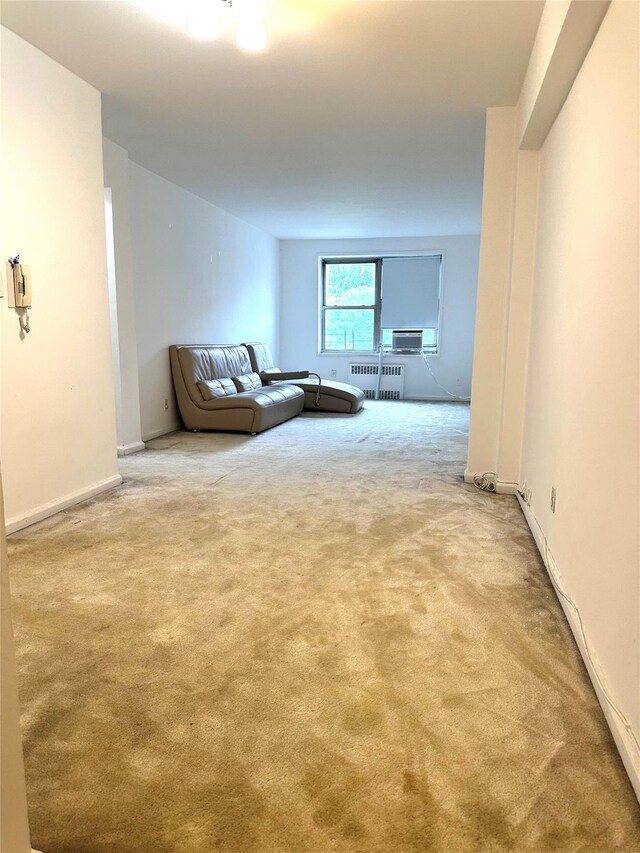 27-04 Parsons Blvd Unit 2G, Flushing, NY 11354 - carpeted living area featuring baseboards