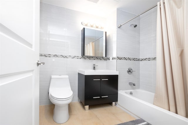 136-20 Booth Memorial Ave Unit 3H, Flushing, NY 11355 - full bathroom with tile walls, vanity, shower / bath combo with shower curtain, and tile patterned floors