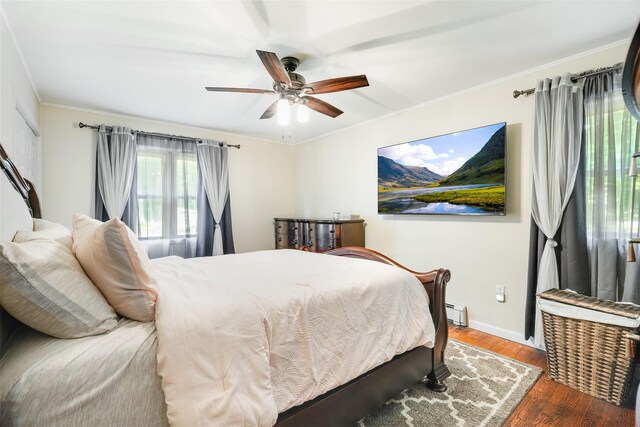 63 Lake Walton Rd, Wappingers Falls, NY 12590 - bedroom with wood finished floors, a baseboard heating unit, crown molding, and a ceiling fan