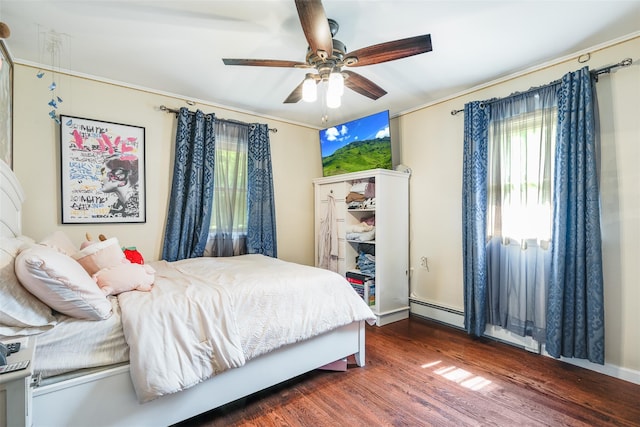 63 Lake Walton Rd, Wappingers Falls, NY 12590 - bedroom featuring wood finished floors, a baseboard heating unit, and a ceiling fan