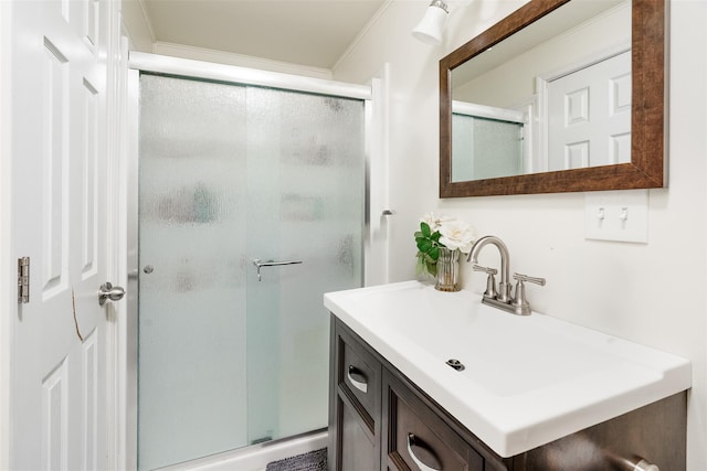 63 Lake Walton Rd, Wappingers Falls, NY 12590 - full bathroom featuring a stall shower, vanity, and ornamental molding