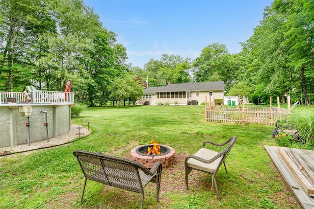 63 Lake Walton Rd, Wappingers Falls, NY 12590 - view of grassy yard with a fire pit and view of wooded area