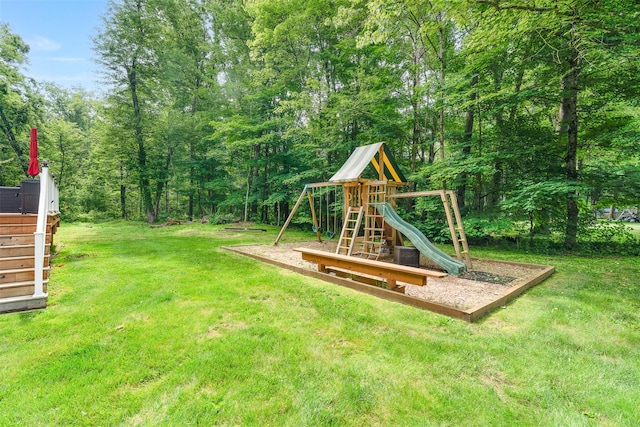 63 Lake Walton Rd, Wappingers Falls, NY 12590 - view of grassy yard with a playground and a wooded view