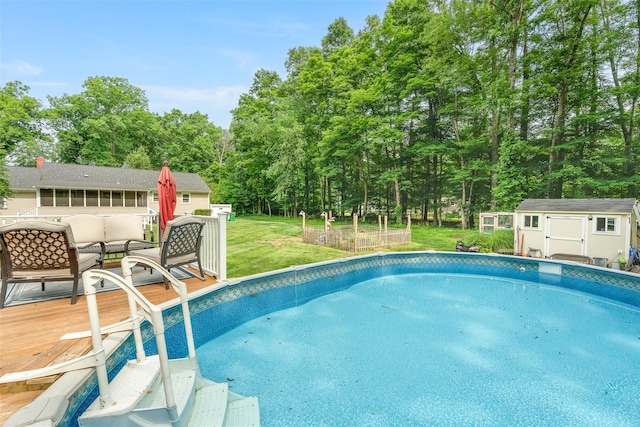 63 Lake Walton Rd, Wappingers Falls, NY 12590 - outdoor pool with a storage shed, a yard, view of scattered trees, and a deck