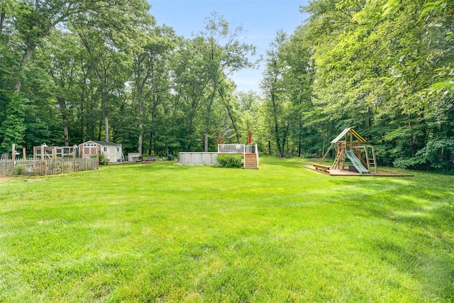 63 Lake Walton Rd, Wappingers Falls, NY 12590 - view of yard featuring a playground and an outdoor structure