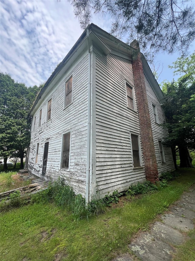 60 Cochecton Rd, Cochecton, NY 12726 - view of side of home with a chimney