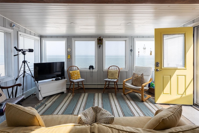 22 Creek Rd, Wading River, NY 11792 - sunroom featuring baseboard heating, wooden ceiling, and wood finished floors