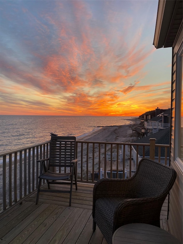 22 Creek Rd, Wading River, NY 11792 - deck at dusk with view of water and beach