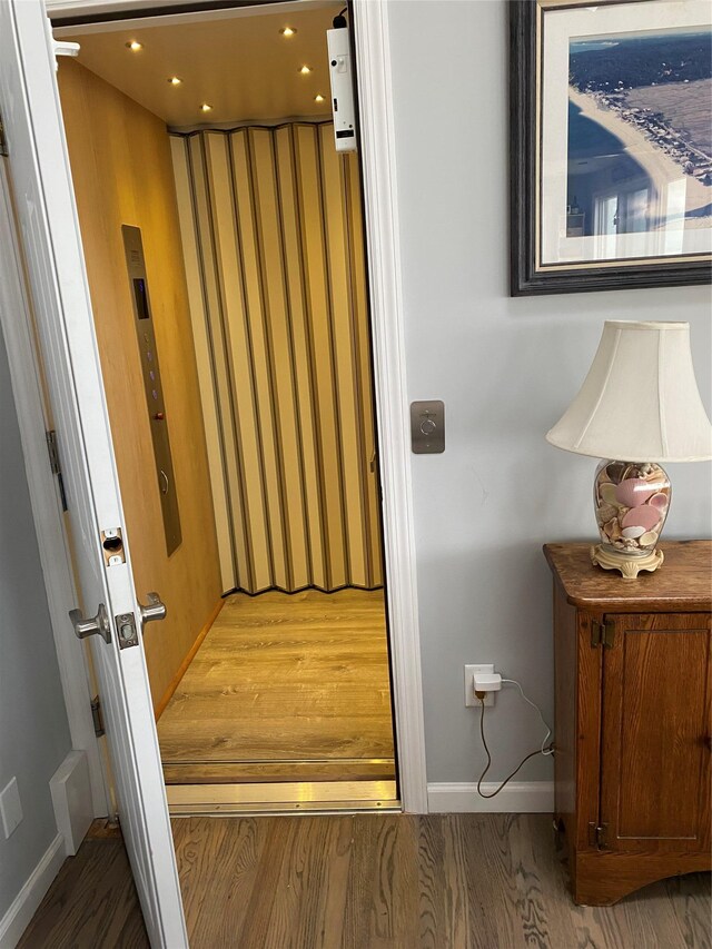 22 Creek Rd, Wading River, NY 11792 - hallway with wood finished floors and elevator