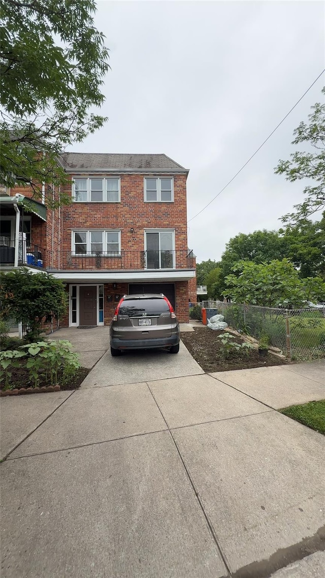 232-04 88th Ave, Queens Village, NY 11427 - townhome / multi-family property featuring brick siding and concrete driveway