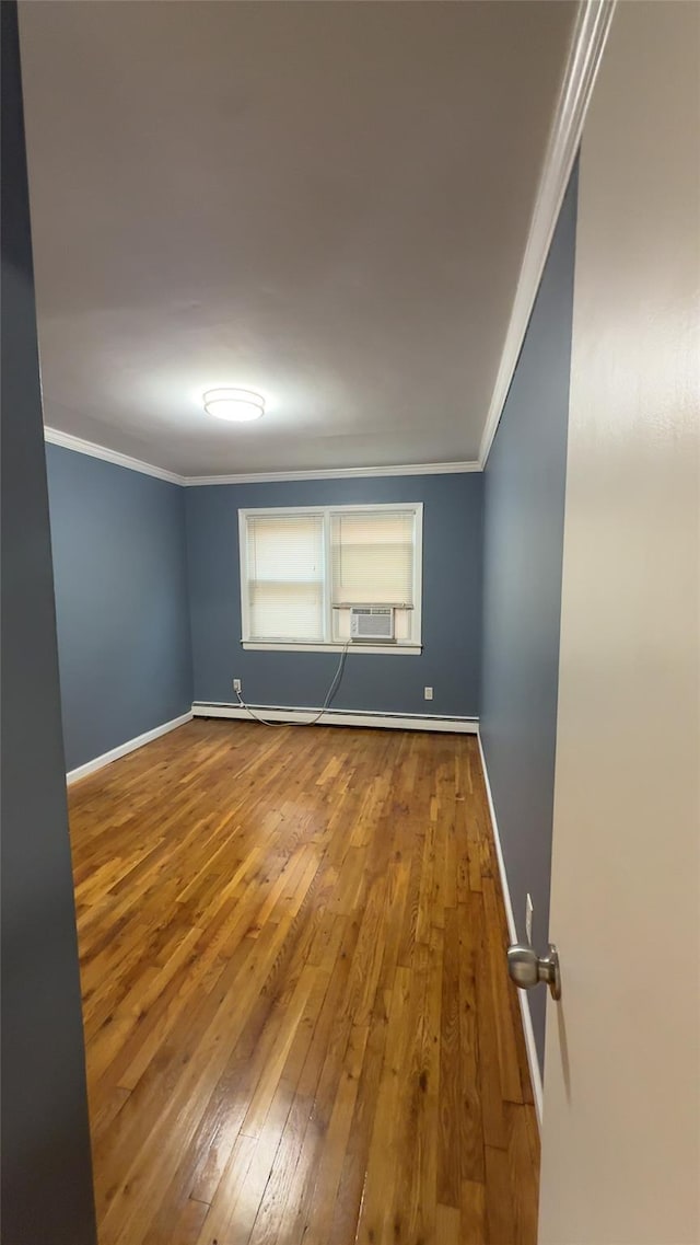 232-04 88th Ave, Queens Village, NY 11427 - unfurnished room featuring hardwood / wood-style floors, crown molding, and cooling unit