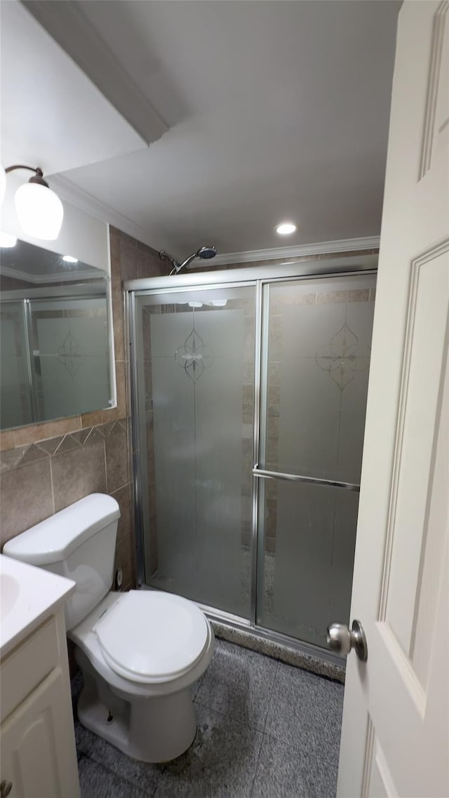 232-04 88th Ave, Queens Village, NY 11427 - full bathroom with tile walls, vanity, crown molding, and tiled shower