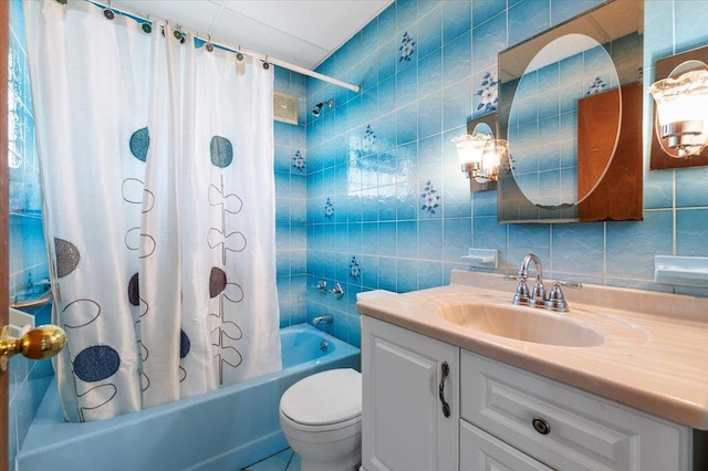 2354 7th St, East Meadow, NY 11554 - bathroom featuring vanity, shower / bath combination with curtain, tile walls, and tasteful backsplash