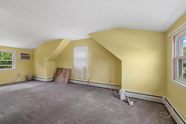 2354 7th St, East Meadow, NY 11554 - bonus room with baseboard heating, a wall mounted AC, lofted ceiling, and carpet flooring