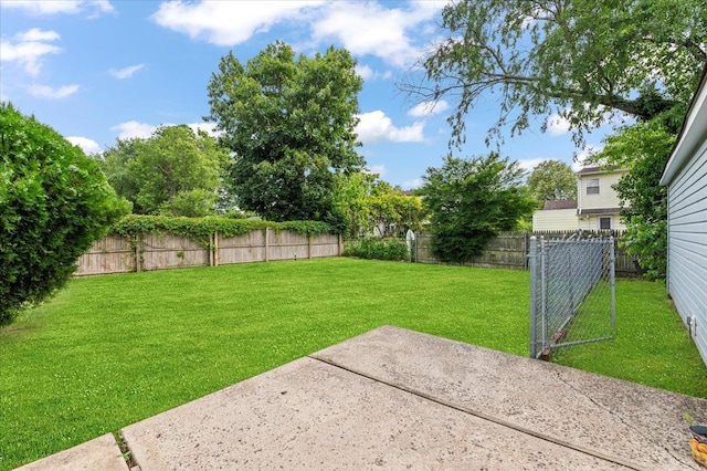 2354 7th St, East Meadow, NY 11554 - fenced backyard with a patio area