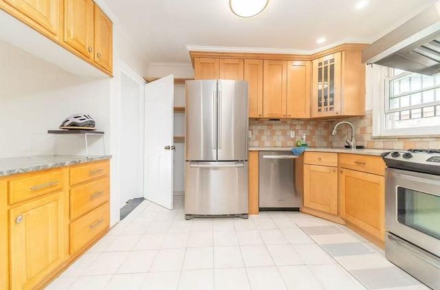 40-02 202nd St, Bayside, NY 11361 - kitchen with appliances with stainless steel finishes, wall chimney exhaust hood, tasteful backsplash, glass insert cabinets, and light stone countertops