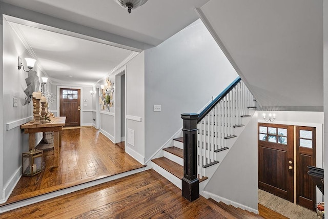 41 River Rd, Nyack, NY 10960 - entryway with a chandelier, stairway, wood-type flooring, and crown molding