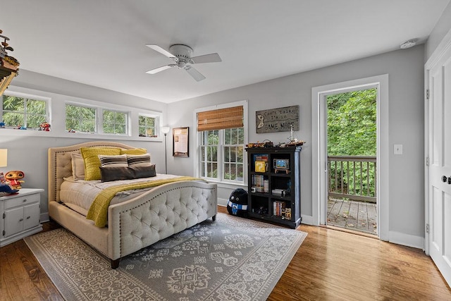 41 River Rd, Nyack, NY 10960 - bedroom with wood finished floors, a ceiling fan, and access to exterior
