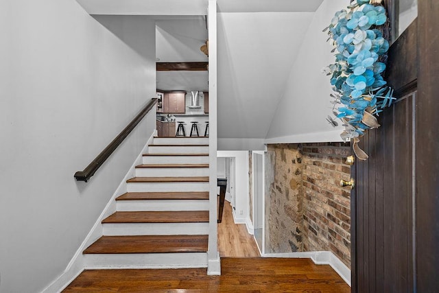 41 River Rd, Nyack, NY 10960 - staircase with wood finished floors and brick wall