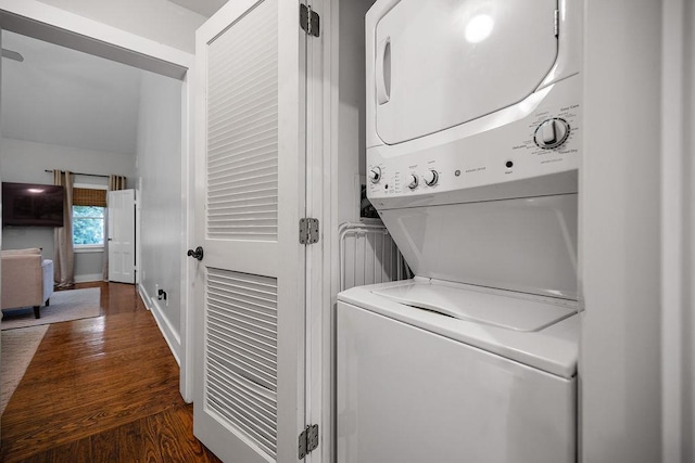 41 River Rd, Nyack, NY 10960 - laundry room with stacked washer / dryer and dark wood-type flooring