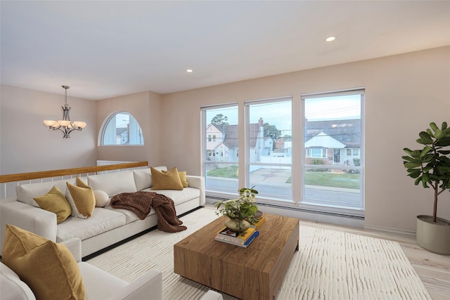 2508 Centre Ave, Bellmore, NY 11710 - living area with a chandelier, light wood-style flooring, and recessed lighting