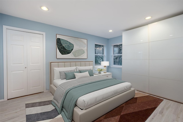 2508 Centre Ave, Bellmore, NY 11710 - bedroom with light wood-style flooring and recessed lighting