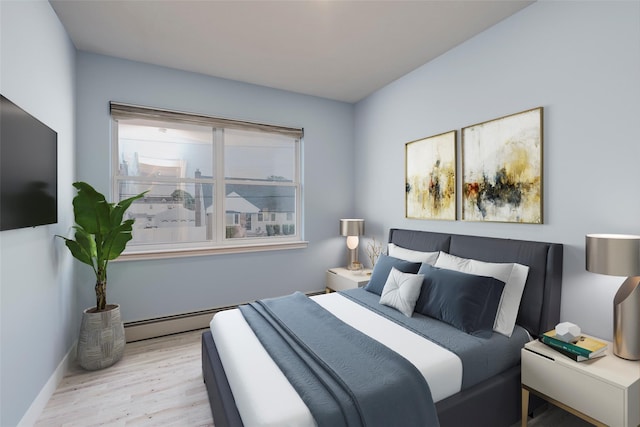 2508 Centre Ave, Bellmore, NY 11710 - bedroom with wood finished floors and a baseboard radiator