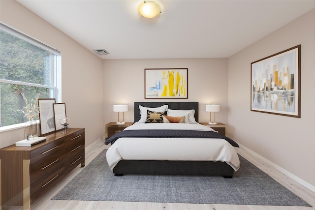 2508 Centre Ave, Bellmore, NY 11710 - bedroom featuring light wood-type flooring and baseboards