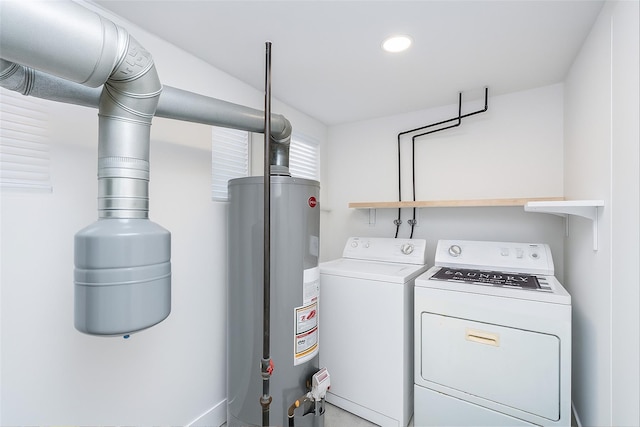2508 Centre Ave, Bellmore, NY 11710 - washroom with water heater, washing machine and clothes dryer, and recessed lighting