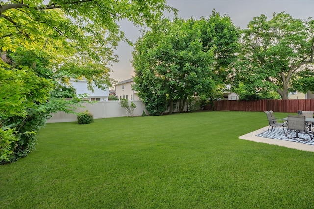 2508 Centre Ave, Bellmore, NY 11710 - fenced backyard featuring a patio area