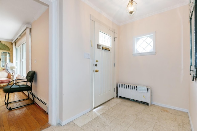 11 Webb Hill Rd, Great Neck, NY 11020 - foyer with radiator, crown molding, and baseboard heating