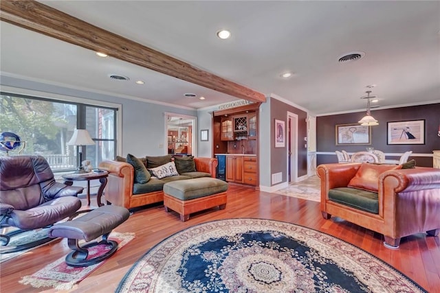 84 Highview Ave, Nanuet, NY 10954 - living room with ornamental molding, a dry bar, wood finished floors, and recessed lighting