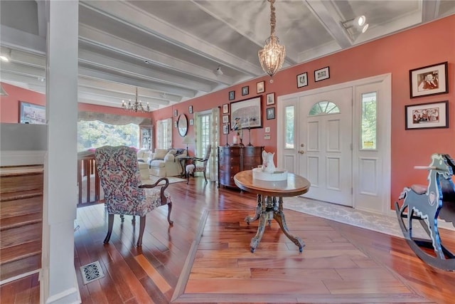 84 Highview Ave, Nanuet, NY 10954 - entrance foyer with a chandelier and beam ceiling