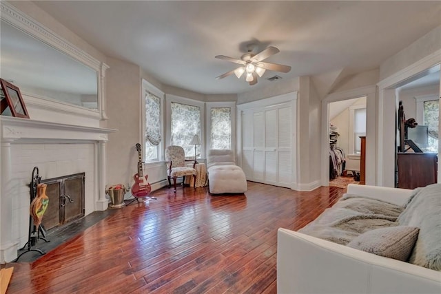 84 Highview Ave, Nanuet, NY 10954 - living room with a ceiling fan, hardwood / wood-style flooring, and a fireplace