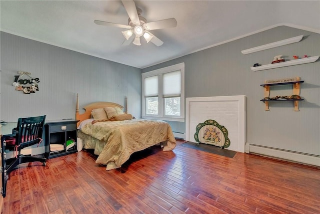 84 Highview Ave, Nanuet, NY 10954 - bedroom featuring wood finished floors, baseboard heating, a ceiling fan, and a baseboard heating unit