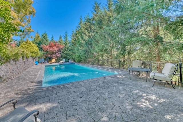 84 Highview Ave, Nanuet, NY 10954 - view of pool with a patio area and view of scattered trees