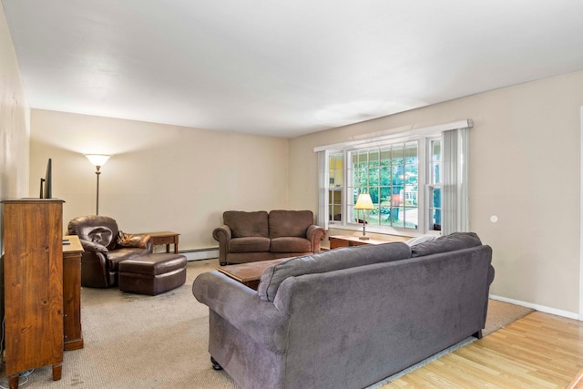 5 Seward Ln, Stony Brook, NY 11790 - living room with a baseboard radiator and light wood-type flooring
